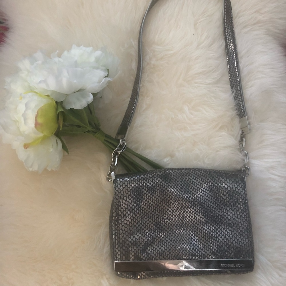 ***SOLD****Michael Kors Metallic leather clutch